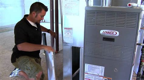 Slide the air filter out of its housing. . How to change filter on lennox elite series